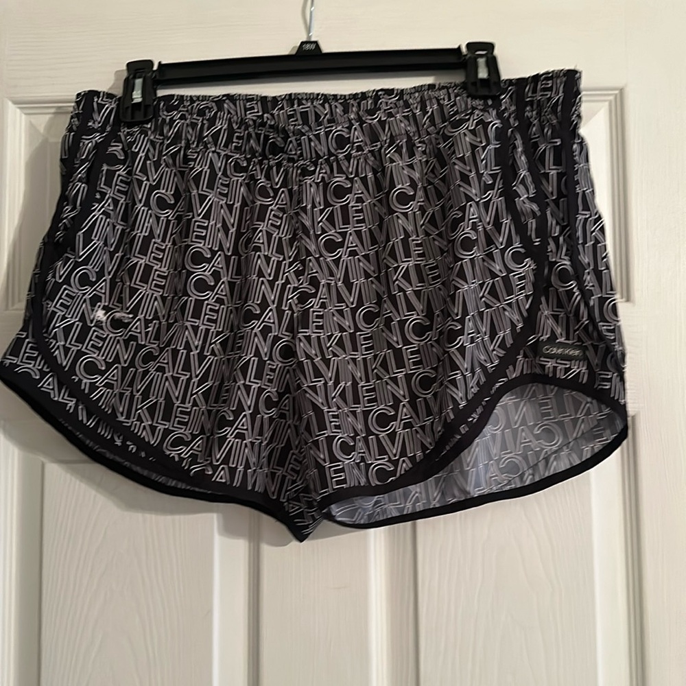 Calvin Klein XL women’s shorts. Super comfy- does have small paint stain front.
